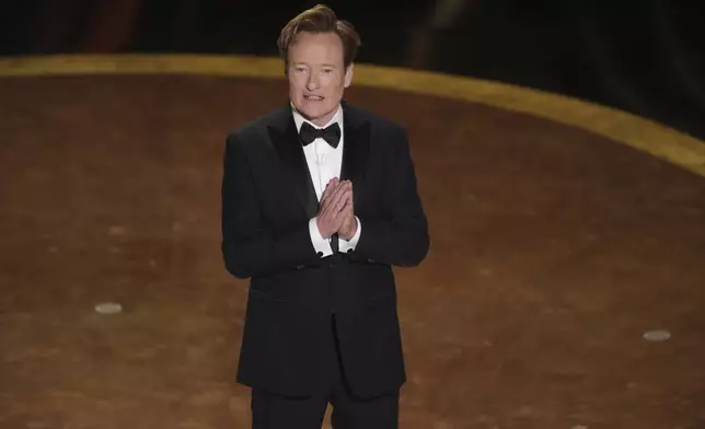 Host Conan O'Brien speaks during the Oscars on Sunday, March 2, 2025, at the Dolby Theatre in Los Angeles. (AP Photo/Chris Pizzello)