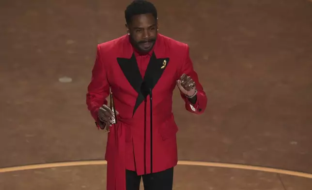 Colman Domingo raises a toast during the Oscars on Sunday, March 2, 2025, at the Dolby Theatre in Los Angeles. (AP Photo/Chris Pizzello)