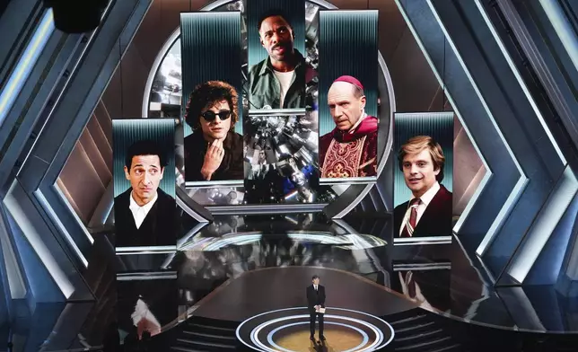 Cillian Murphy presents the award for best performance by an actor in a leading role during the Oscars on Sunday, March 2, 2025, at the Dolby Theatre in Los Angeles. (AP Photo/Chris Pizzello)