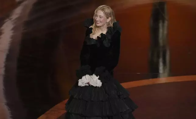 Alba Rohrwacher presents the award for best cinematography during the Oscars on Sunday, March 2, 2025, at the Dolby Theatre in Los Angeles. (AP Photo/Chris Pizzello)