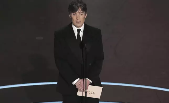 Cillian Murphy presents the award for best performance by an actor in a leading role during the Oscars on Sunday, March 2, 2025, at the Dolby Theatre in Los Angeles. (AP Photo/Chris Pizzello)