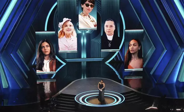 Da'Vine Joy Randolph presents the award for best performance by an actress in a supporting role during the Oscars on Sunday, March 2, 2025, at the Dolby Theatre in Los Angeles. (AP Photo/Chris Pizzello)