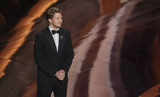 Joe Alwyn presents the award for best cinematography during the Oscars on Sunday, March 2, 2025, at the Dolby Theatre in Los Angeles. (AP Photo/Chris Pizzello)