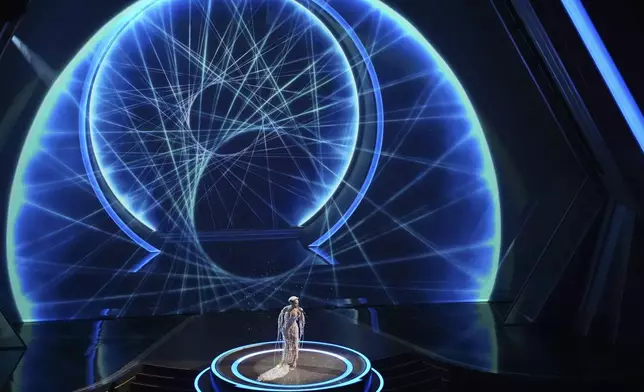 Doja Cat sings "Diamonds are forever" during the Oscars on Sunday, March 2, 2025, at the Dolby Theatre in Los Angeles. (AP Photo/Chris Pizzello)