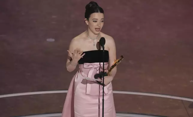 Mikey Madison accepts the award for best performance by an actress in a leading role for "Anora" during the Oscars on Sunday, March 2, 2025, at the Dolby Theatre in Los Angeles. (AP Photo/Chris Pizzello)