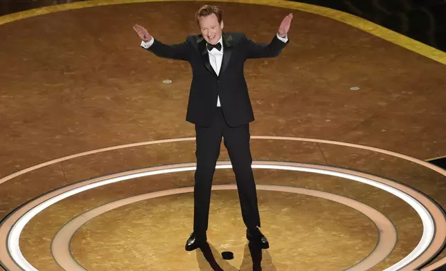 Host Conan O'Brien speaks during the Oscars on Sunday, March 2, 2025, at the Dolby Theatre in Los Angeles. (AP Photo/Chris Pizzello)