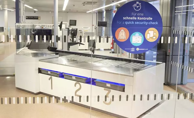 Security checkpoints are empty at Hamburg Airport, Germany Sunday, March 9, 2025. Georg Wendt/dpa via AP)