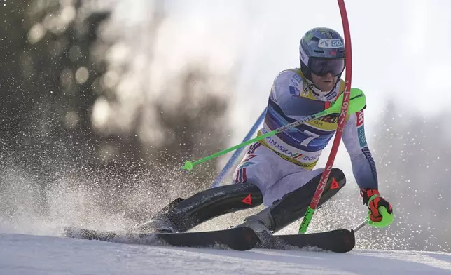 Norway's Timon Haugan competes in an alpine ski, men's World Cup slalom, in Kranjska Gora, Slovenia, Sunday, March 2, 2025. (AP Photo/Pier Marco Tacca)