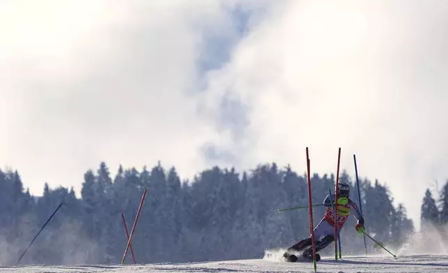 Norway's Henrik Kristoffersen competes in an alpine ski, men's World Cup slalom, in Kranjska Gora, Slovenia, Sunday, March 2, 2025. (AP Photo/Giovanni Auletta)