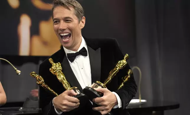 Sean Baker, winner of the awards for best original screenplay, best film editing, best director, and best picture for "Anora," attends the Governors Ball after the Oscars on Sunday, March 2, 2025, in Los Angeles. (AP Photo/John Locher)