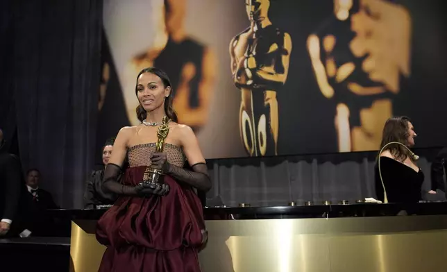 Zoe Saldana, winner of the award for best performance by an actress in a supporting role for "Emilia Perez," attends the Governors Ball after the Oscars on Sunday, March 2, 2025, in Los Angeles. (AP Photo/John Locher)