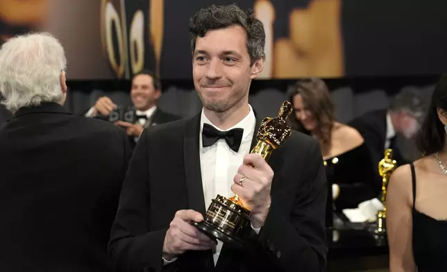 Alex Coco, winner of the award for best picture for "Anora," attends the Governors Ball after the Oscars on Sunday, March 2, 2025, in Los Angeles. (AP Photo/John Locher)