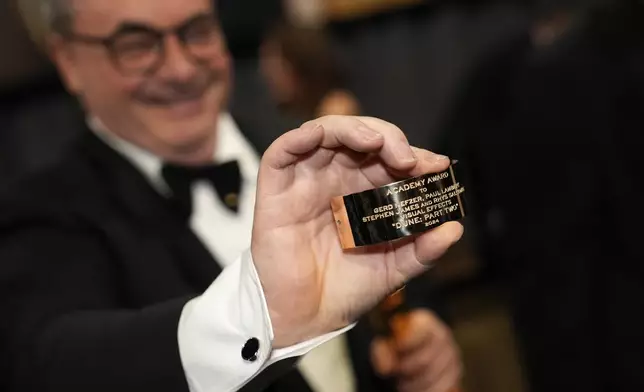 Gerd Nefzer, winner of the award for best visual effects for "Dune: Part Two," attends the Governors Ball after the Oscars on Sunday, March 2, 2025, in Los Angeles. (AP Photo/John Locher)