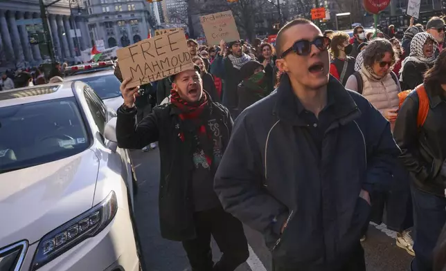 Protestors demonstrate and demand the release of Palestinian activist Mahmoud Khalil, Monday, March 10, 2025, outside the Jacob K. Javits Federal Building in New York. (AP Photo/Yuki Iwamura)