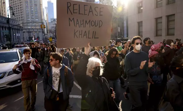 Protestors demonstrate and demand the release of Palestinian activist Mahmoud Khalil, Monday, March 10, 2025, outside the Jacob K. Javits Federal Building in New York. (AP Photo/Yuki Iwamura)