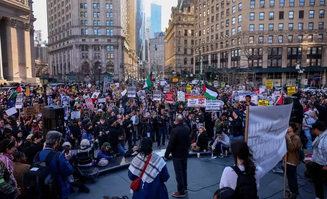 Protestors demonstrate and demand the release of Palestinian activist Mahmoud Khalil, Monday, March 10, 2025, outside the Jacob K. Javits Federal Building in New York. (AP Photo/Yuki Iwamura)