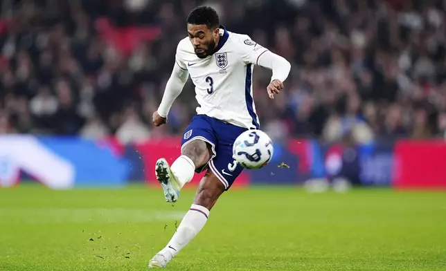 England's Reece James scores scores his side's opening goal during a World Cup qualifying soccer match between England and Latvia at Wembley stadium in London, Monday, March 24, 2025. (Mike Egerton, PA via AP)