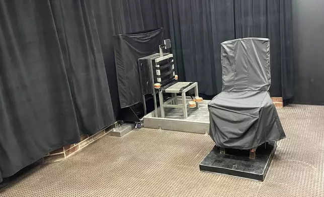 FILE - This photo provided by the South Carolina Department of Corrections shows the state's death chamber in Columbia, S.C., including the electric chair, right, and a firing squad chair, left. The South Carolina Supreme Court will hear arguments Tuesday, Feb. 6, 2024, on whether the state can use the electric chair, firing squad or a new lethal injection protocol to carry out its first executions in nearly 13 years. (South Carolina Department of Corrections via AP, File)