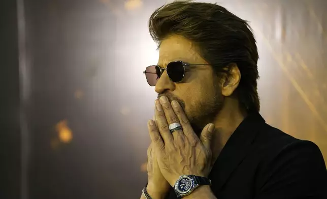 Indian Bollywood actor and film producer Shah Rukh Khan arrives for the International Indian Film Academy (IIFA) awards ceremony in Jaipur, India, Sunday, March 9, 2025. (AP Photo/Deepak Sharma)