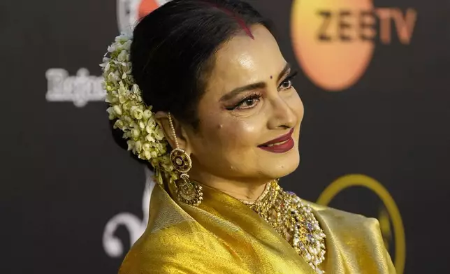 Bollywood actor Rekha poses for a photograph as she arrives for the International Indian Film Academy (IIFA) awards ceremony in Jaipur, India, Sunday, March 9, 2025. (AP Photo/Deepak Sharma)