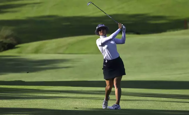 Hannah Green of Australia plays a shot during the round four of the HSBC Women's World Championship 2025 at Sentosa Golf Club in Singapore, Sunday, March 2, 2025. (AP Photo/Suhaimi Abdullah)