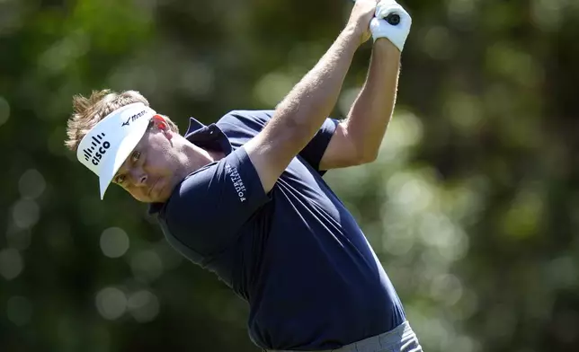 Keith Mitchell hits his tee shot on the ninth hole during the first round of the Valspar Championship golf tournament Thursday, March 20, 2025, at Innisbrook in Palm Harbor, Fla. (AP Photo/Chris O'Meara)