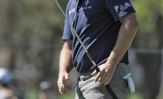 Keith Mitchell watches his putt on the fifth hole during the first round of the Valspar Championship golf tournament Thursday, March 20, 2025, at Innisbrook in Palm Harbor, Fla. (AP Photo/Chris O'Meara)