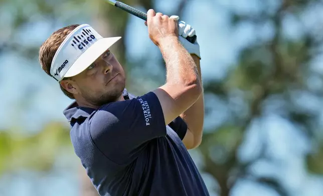 Keith Mithcell watches his tee shot on the sixth hole during the first round of the Valspar Championship golf tournament Thursday, March 20, 2025, at Innisbrook in Palm Harbor, Fla. (AP Photo/Chris O'Meara)