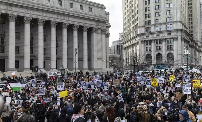 A crowd gathers in Foley Square, outside the Manhattan federal court, in support of Mahmoud Khalil, Wednesday, March 12, 2025, in New York. (AP Photo/Stefan Jeremiah)