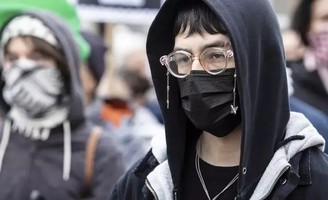 A person in Foley Square, outside the Manhattan federal court, in support of Mahmoud Khalil, Wednesday, March 12, 2025, in New York. (AP Photo/Stefan Jeremiah)