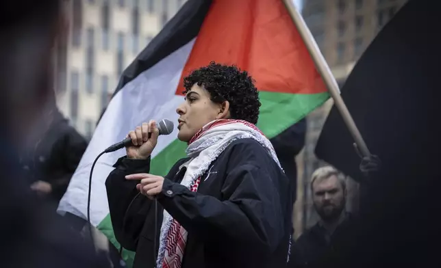 A person speaks to the crowd gathered in Foley Square, outside the Manhattan federal court, prior to the deportation case of Mahmoud Khalil, Wednesday, March 12, 2025, in New York. (AP Photo/Stefan Jeremiah)