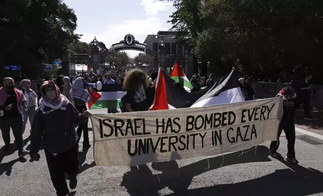 Protesters march on campus against the arrest of Mahmoud Khalil at UC Berkeley on Tuesday, March 11, 2025, in Berkeley, Calif. (Santiago Mejia/San Francisco Chronicle via AP)