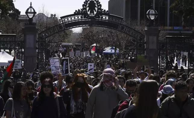 Protesters march on campus against the arrest of Mahmoud Khalil at UC Berkeley on Tuesday, March 11, 2025, in Berkeley, Calif. (Santiago Mejia/San Francisco Chronicle via AP)