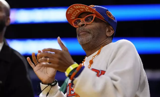 Actor/director Spike Lee watches during the first half of an NBA basketball game between the Los Angeles Lakers and the New York Knicks, Thursday, March 6, 2025, in Los Angeles. (AP Photo/Mark J. Terrill)