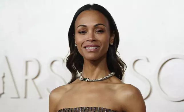 Zoe Saldana arrives at the Oscars on Sunday, March 2, 2025, at the Dolby Theatre in Los Angeles. (Photo by Jordan Strauss/Invision/AP)