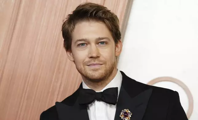 Joe Alwyn arrives at the Oscars on Sunday, March 2, 2025, at the Dolby Theatre in Los Angeles. (Photo by Jordan Strauss/Invision/AP)