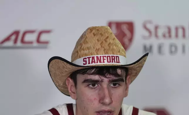 Stanford forward Maxime Raynaud talks to reporters during a press conference, following the team's victory over California in an NCAA college basketball game Saturday, Feb. 22, 2025, in Stanford, Calif. (AP Photo/Godofredo A. Vásquez)