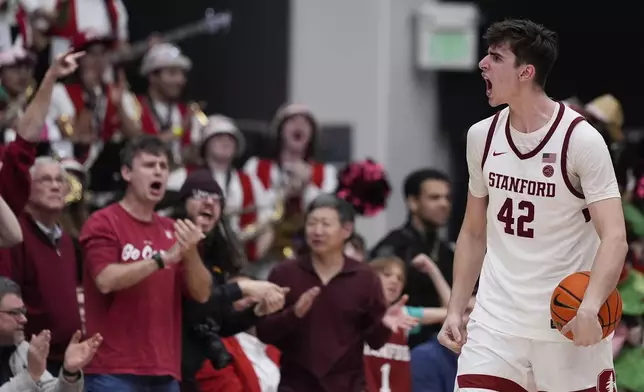 Stanford forward Maxime Raynaud (42) reacts after a defensive stop against California during the second half of an NCAA college basketball game Saturday, Feb. 22, 2025, in Stanford, Calif. (AP Photo/Godofredo A. Vásquez)