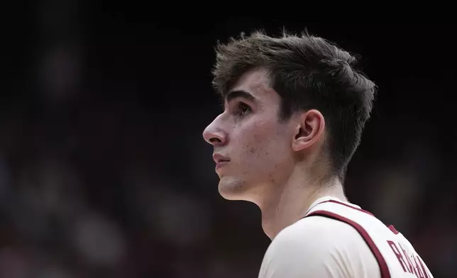 Stanford forward Maxime Raynaud looks up while standing on the court during the second half of an NCAA college basketball game against California, Saturday, Feb. 22, 2025, in Stanford, Calif. (AP Photo/Godofredo A. Vásquez)