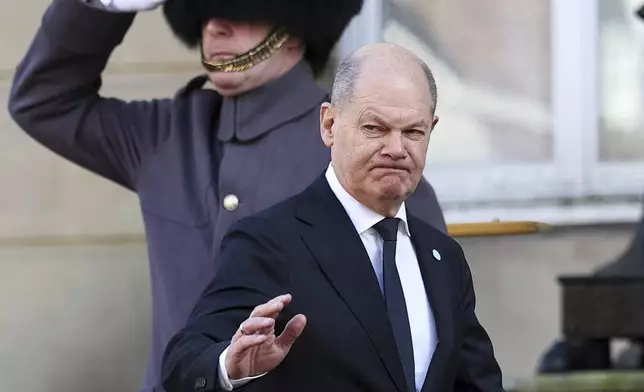 German Chancellor Olaf Scholz arrives for the European leaders' summit to discuss Ukraine, hosted by Britain's Prime Minister Keir Starmer, at Lancaster House, London, Sunday March 2, 2025. (Toby Melville/Pool via AP)