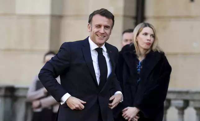 French President Emmanuel Macron arrives for the European leaders' summit to discuss Ukraine hosted by Britain's Prime Minister Keir Starmer, at Lancaster House, London, Sunday March 2, 2025. (Toby Melville/Pool via AP)