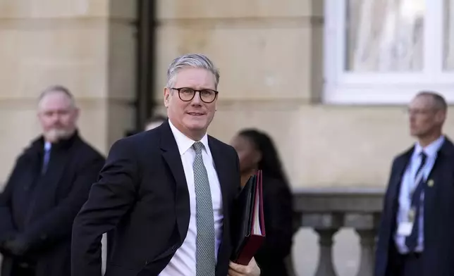 Britain's Prime Minister Keir Starmer arrives for a summit on Ukraine at Lancaster House in London, Sunday, March 2, 2025. (AP Photo/Christophe Ena, Pool)
