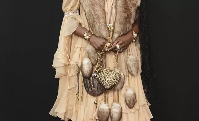 Doechii poses before the Chloe Fall/Winter 2025-2026 Womenswear collection presented Thursday, March 6, 2025. in Paris. (Photo by Scott A Garfitt/Invision/AP)