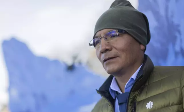 Peruvian mountain farmer and mountain guide Saul Luciano Lliuya arrives at the Higher Regional Court for the hearing of his climate lawsuit against the energy company RWE, in Hamm, Germany, Monday, March 17, 2025. (Rolf Vennenbernd/dpa via AP)