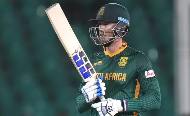 South Africa's Rassie van der Dussen walks toward his batting point during the ICC Champions Trophy cricket match between England and South Africa, in Karachi, Pakistan Saturday, March 1, 2025. (AP Photo/Anjum Naveed)