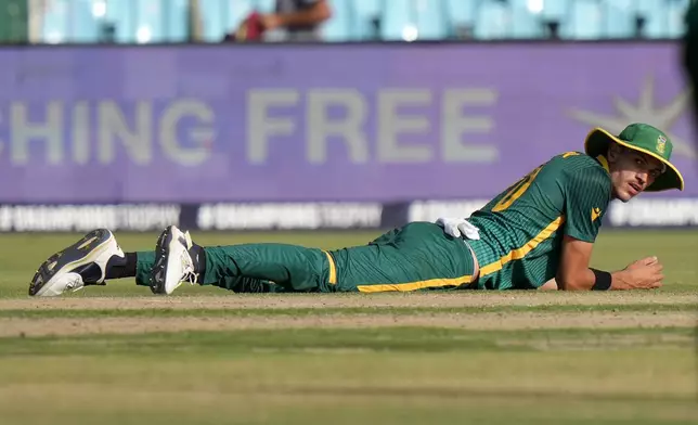 South Africa's Marco Jansen reacts after taking the catch of England's Jofra Archer during the ICC Champions Trophy cricket match between England and South Africa, in Karachi, Pakistan Saturday, March 1, 2025. (AP Photo/Anjum Naveed)