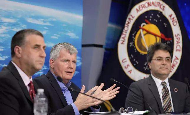 From left, Joel Montalbano, deputy associate administrator, NASA's Space Operations Mission Directorate; Steve Stich, manager, NASA's Commercial Crew Program; and Bill Spetch, operations integration manager, NASA's International Space Station Program, speak to reporters during a press conference at Johnson Space Center on Tuesday, March 18, 2025, in Houston, following the splashdown of astronauts Butch Wilmore, Suni Williams, Nick Hague, and Alexander Gorbunov. (AP Photo/Ashley Landis)