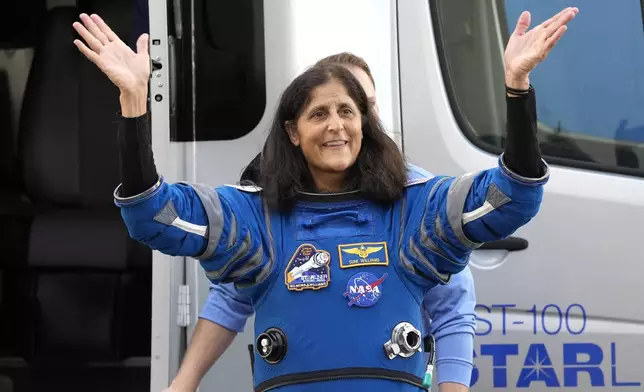 FILE - NASA astronaut Suni Williams reacts before climbing into the astro van after leaving the operations and checkout building for a trip to launch pad at Space Launch Complex 41 Saturday, June 1, 2024, in Cape Canaveral, Fla. (AP Photo/John Raoux, File)