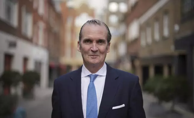 Greg Swenson of Republicans Overseas UK, poses for a photograph in London, Thursday, March 20, 2025. (AP Photo/Kin Cheung)