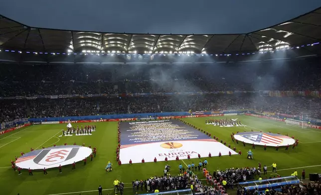 FILE - Opening ceremony prior to the soccer Europa League final between Atletico Madrid and FC Fulham in the arena in Hamburg, Germany, on Wednesday, May 12, 2010. (AP Photo/Michael Sohn, file)
